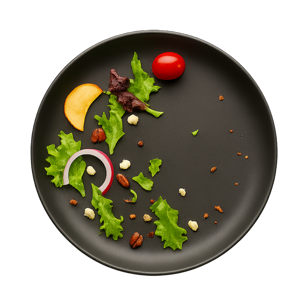 Salad plate partially eaten, still appealing